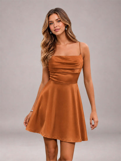 Burnt Orange Stretch Satin Cowl Neck Spaghetti Strap Pleated Mini Homecoming Dress with Lace Up Back